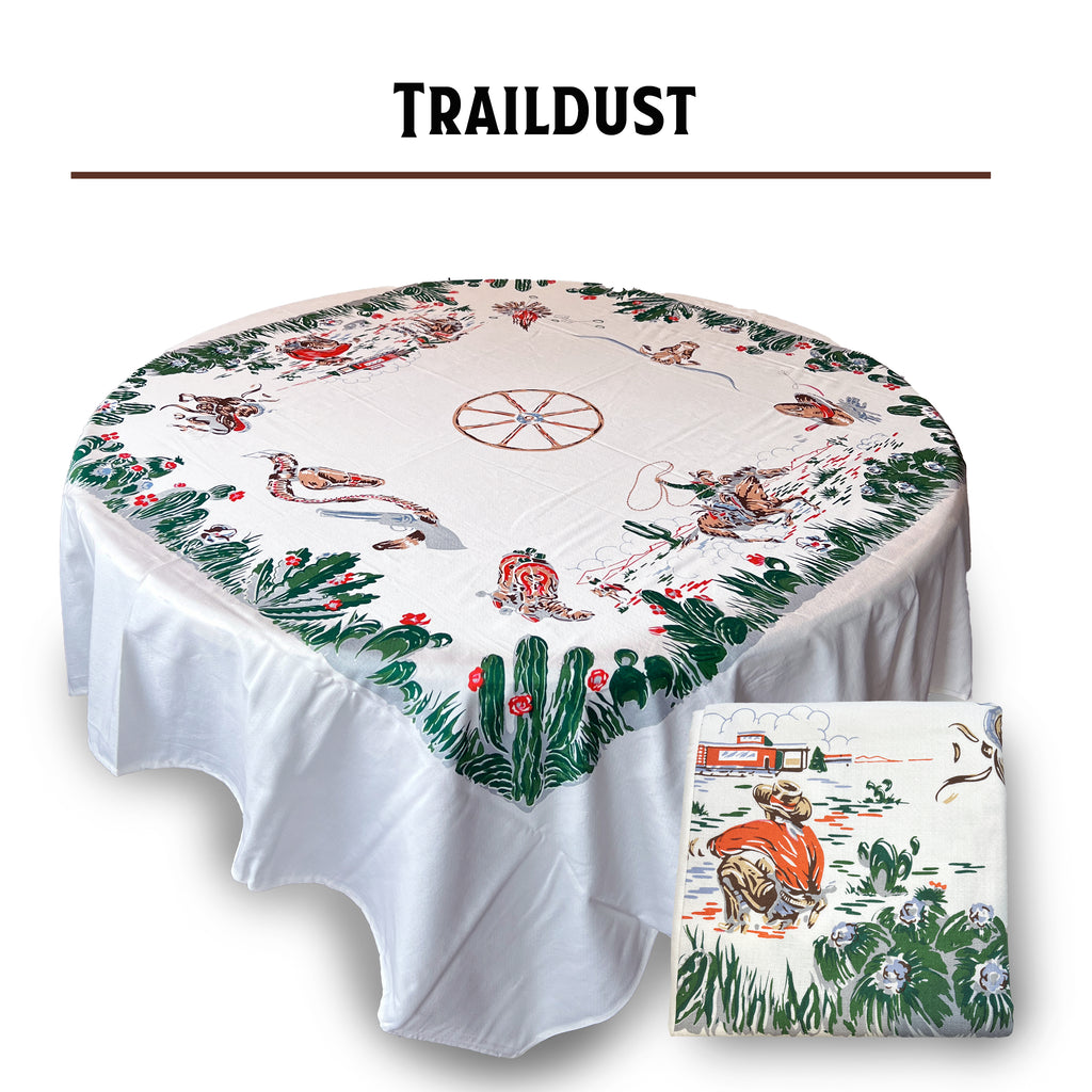 Vintage cowboy trail dust 100% cotton tablecloth, 60-inch square, 1940s reproduction, silk screen printed, Western motif with cactus, wagon wheel, cowboy boots, six shooter, campfire, lasso, cowboy hat